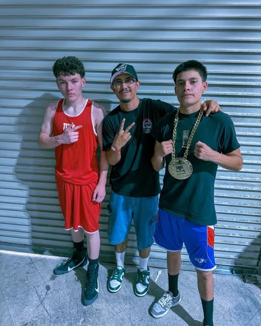 Young fighters with championship belts